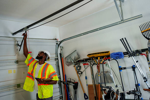 Professional Garage Door Panel Replacement technician working in Harvest, AL